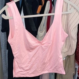 cute pink tank top with slits on the sides